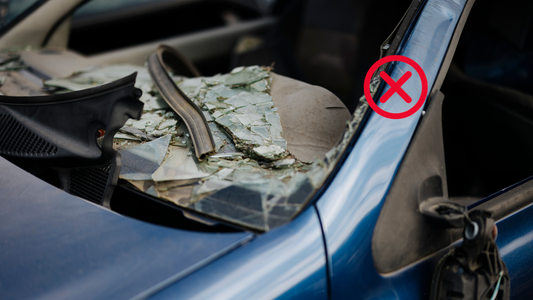 Shattered car window glass after an emergency escape – debunking window-breaking myths